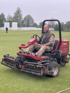 Grounds keeper cutting the grass at Doncaster town cricket club